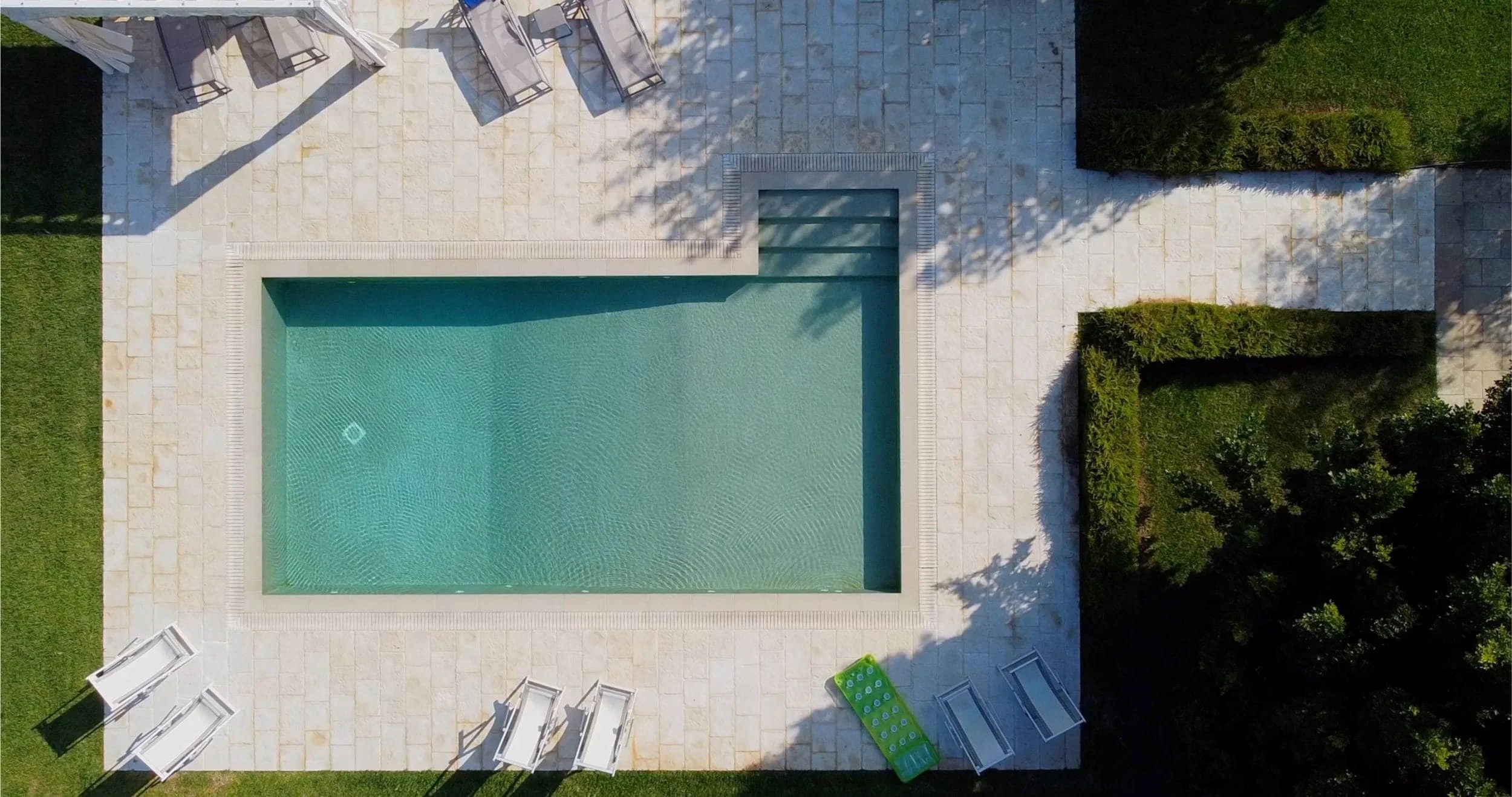 Paver walkway through a South Florida garden